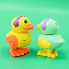 Key Operated Wind Up Toys Colourful Jumping Moving Toy - Rotating head - 1 Duck