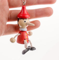 Wooden pinocchio Nose Key chain - pack of 1 joker key chain