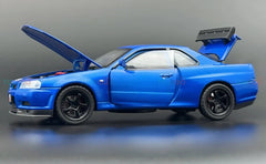 Blue die-cast model of a Nissan Skyline GT-R R34 1:32 Scale Openable Doors & Light, Music Toy