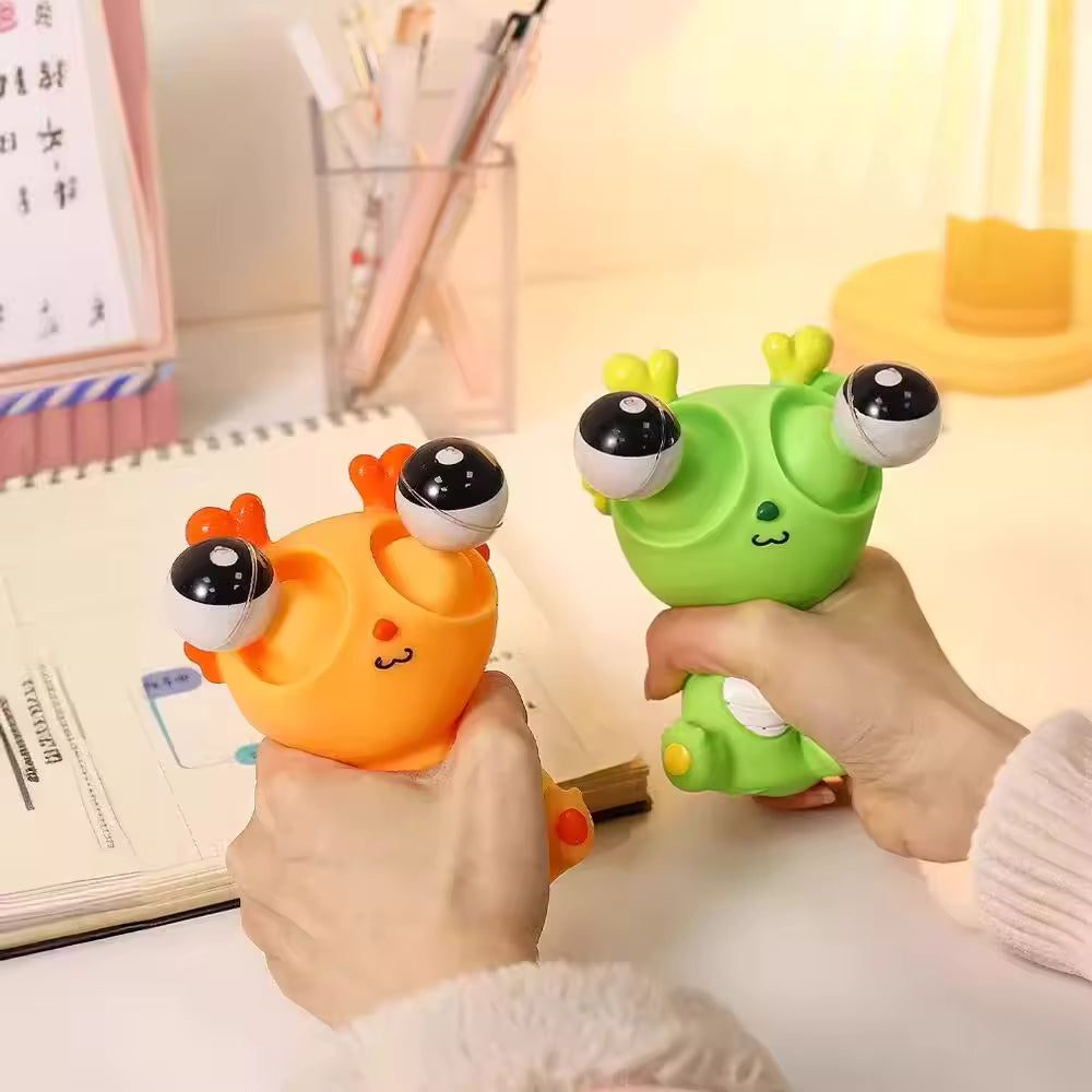 Cartoon Pop up Eye Lighting silicon Toy - Any 1 Random squishy toy