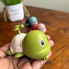 Press and go tortoise