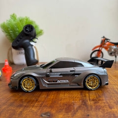 High-Speed 1:16 Remote Control GTR Style Drift Racing Car - Gunmetal Grey Edition with Extra Tires