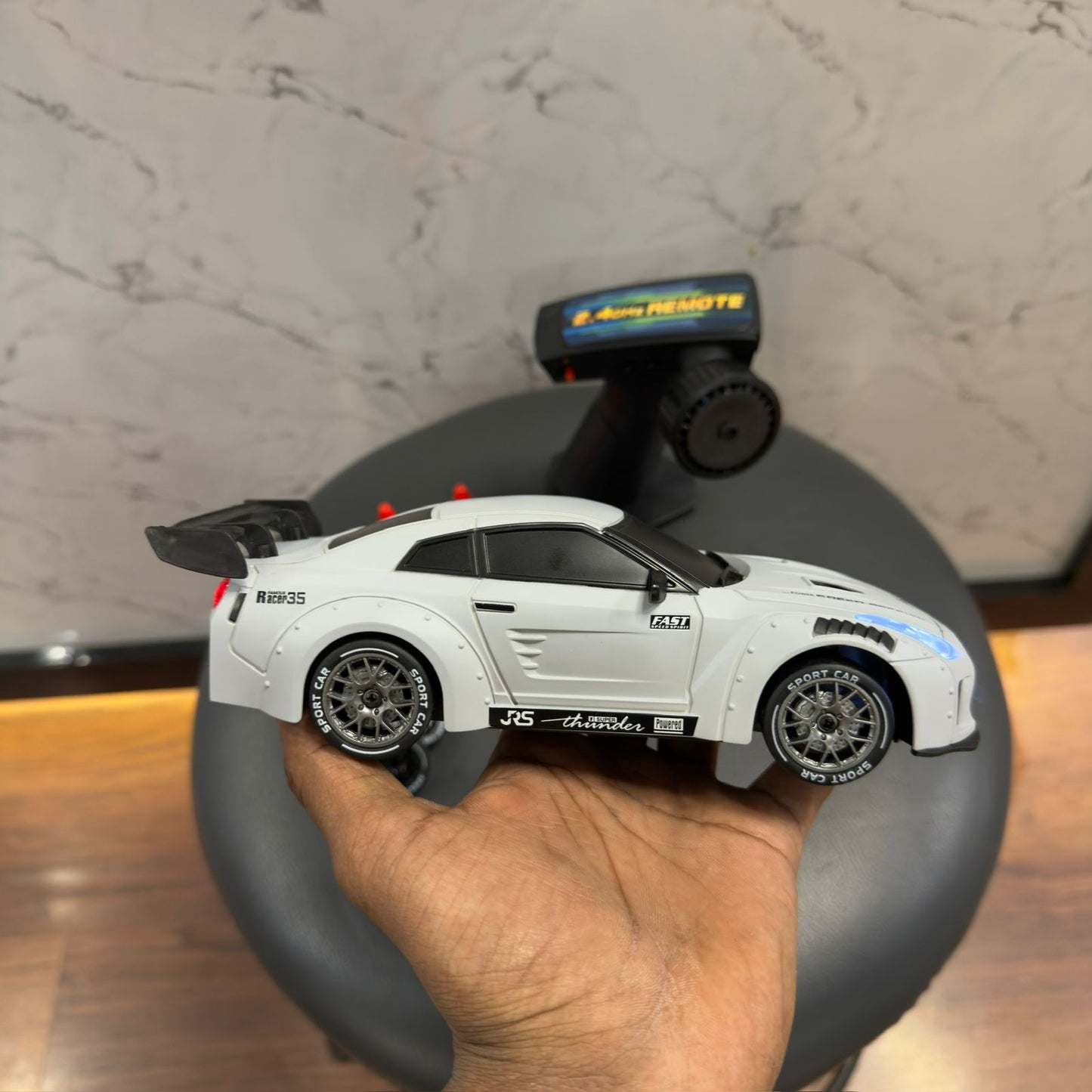 Nissan GTR white Drift Car 1:24 Scale,2.4Ghz Remote Control,4WD,20Km/Hr Max Speed,2 Speed Modes,1 Batteries,Multicolour