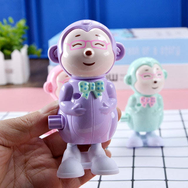 Key Operated Wind Up Toys Colourful Jumping Moving Toy - Rotating head - Monkey