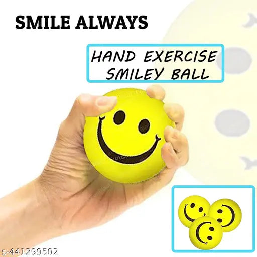 Hand holding a yellow smiley ball with text 'SMILE ALWAYS HAND EXERCISE SMILEY BALL' on a light background.