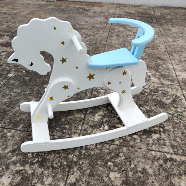 White rocking horse with blue seat 