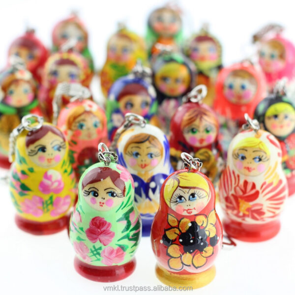 Colorful Russian nesting doll keychains on a white background