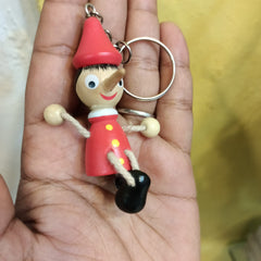 Wooden pinocchio Nose Key chain - pack of 1 joker key chain