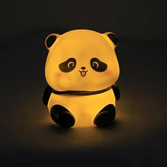 Cute panda-shaped night light glowing in the dark